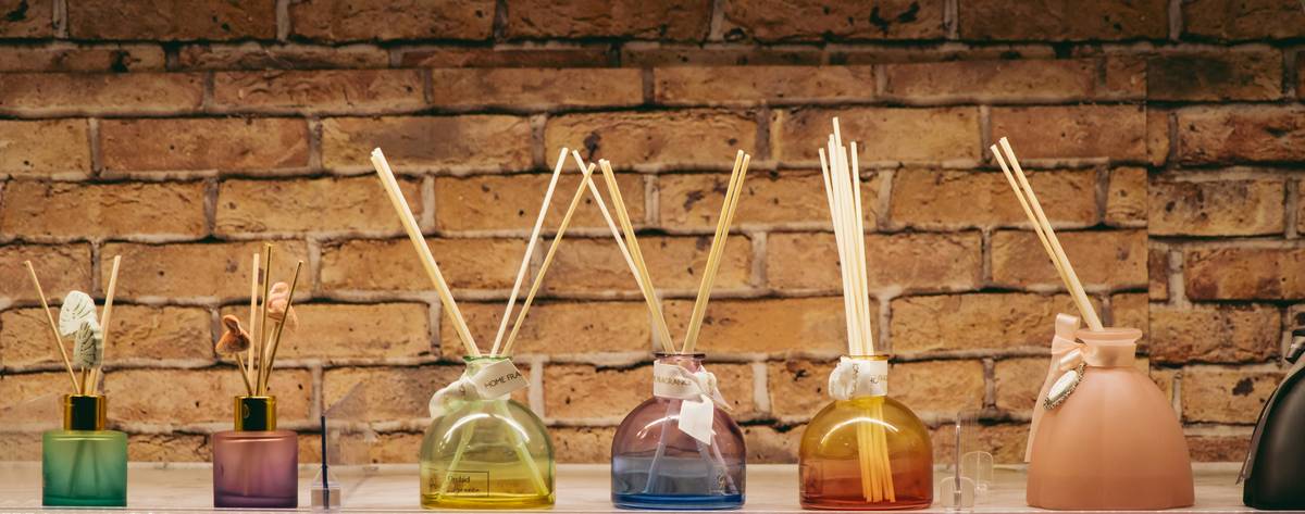 comparison of natural home scent recipes in decorative jars and bowls
