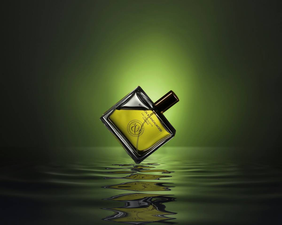 Elegant reusable glass diffuser filled with natural designer fragrances air freshener blend