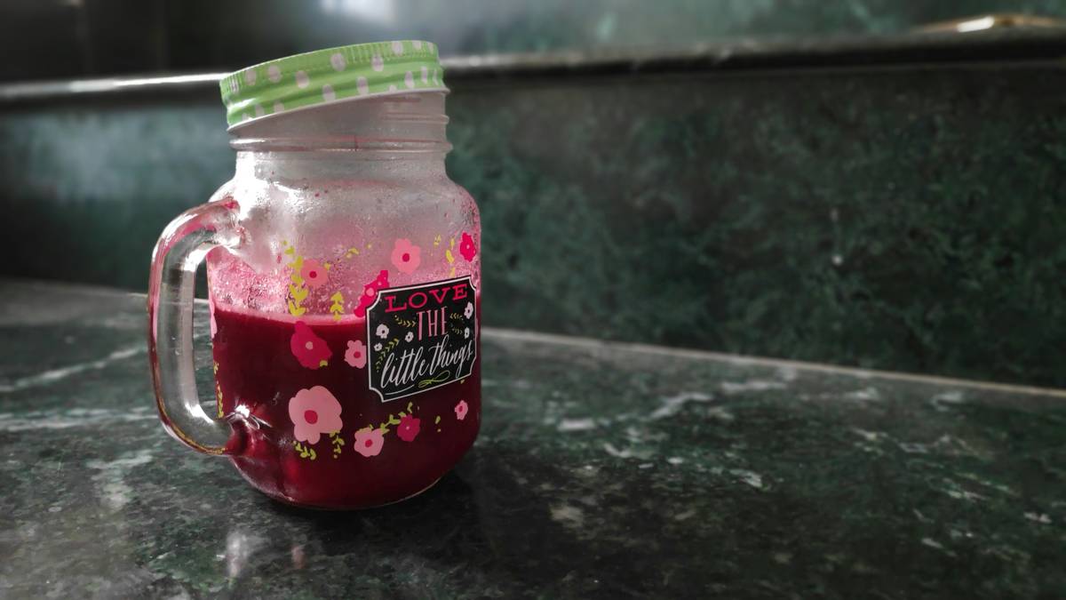 Homemade gel based air freshener in a mason jar with citrus peels and essential oils